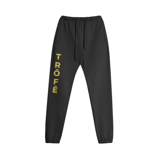 TRŌFĒ Gold Logo Sweatpants black front