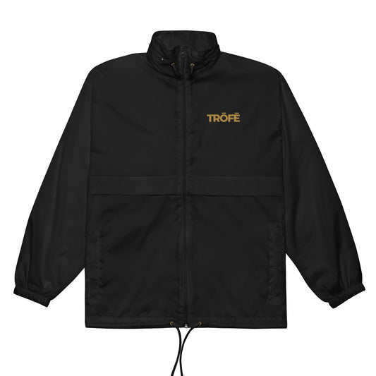 TRŌFĒ Gold Logo Unisex Windbreaker Jacket front 